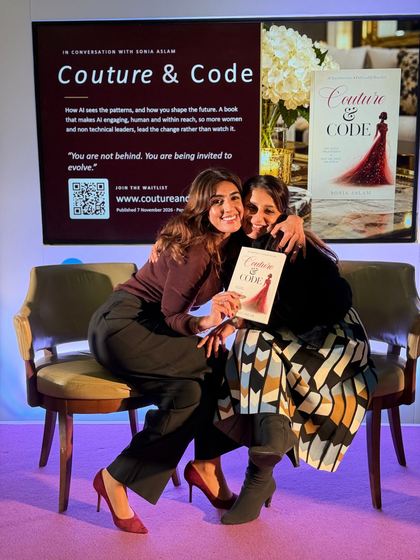 Sonia Aslam embracing a guest after the Couture & Code session