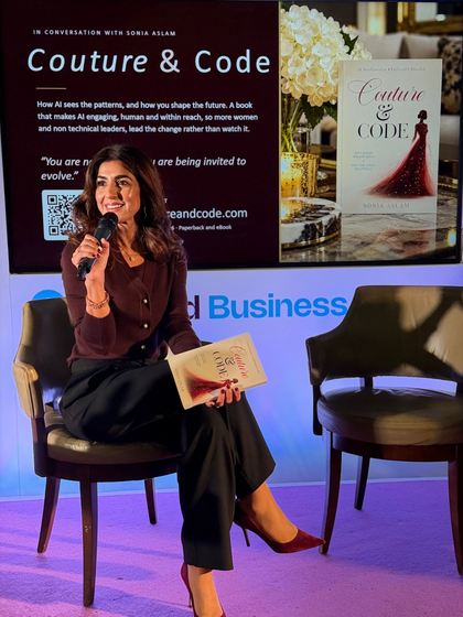 Sonia Aslam reading from Couture & Code on stage