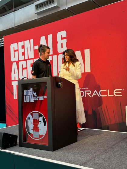 Sonia Aslam on stage at a Gen-AI and Agentic AI summit