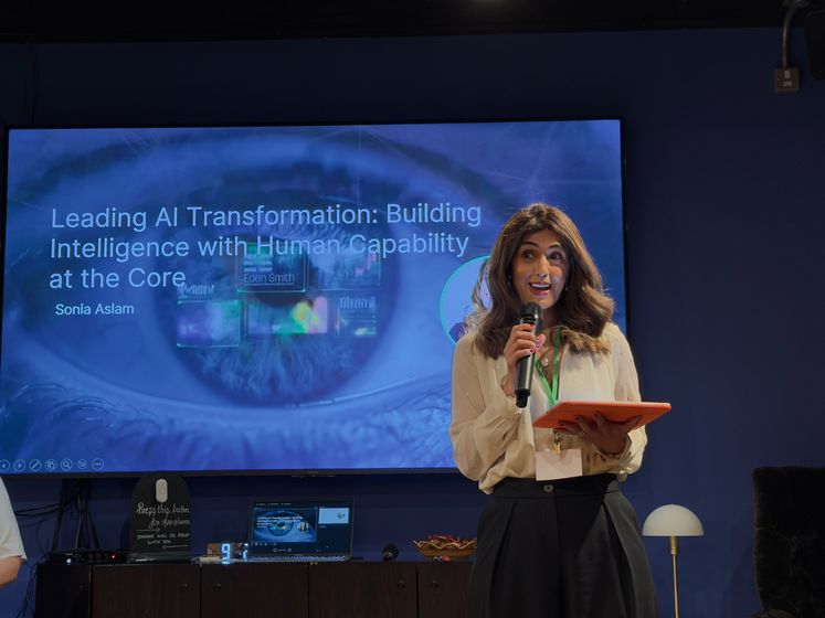 Sonia Aslam delivering a keynote on leading AI transformation