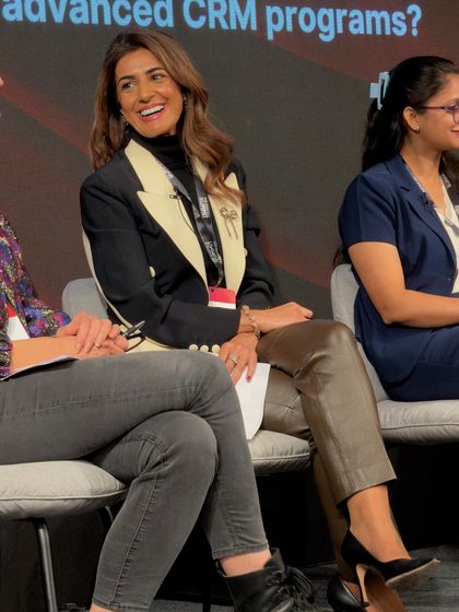 Sonia Aslam on a panel at a data and marketing summit